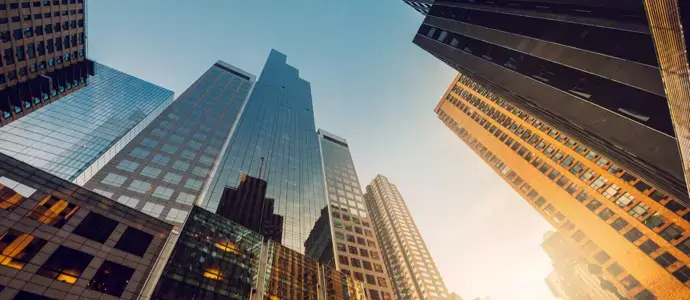 Upward view of modern glass skyscraper